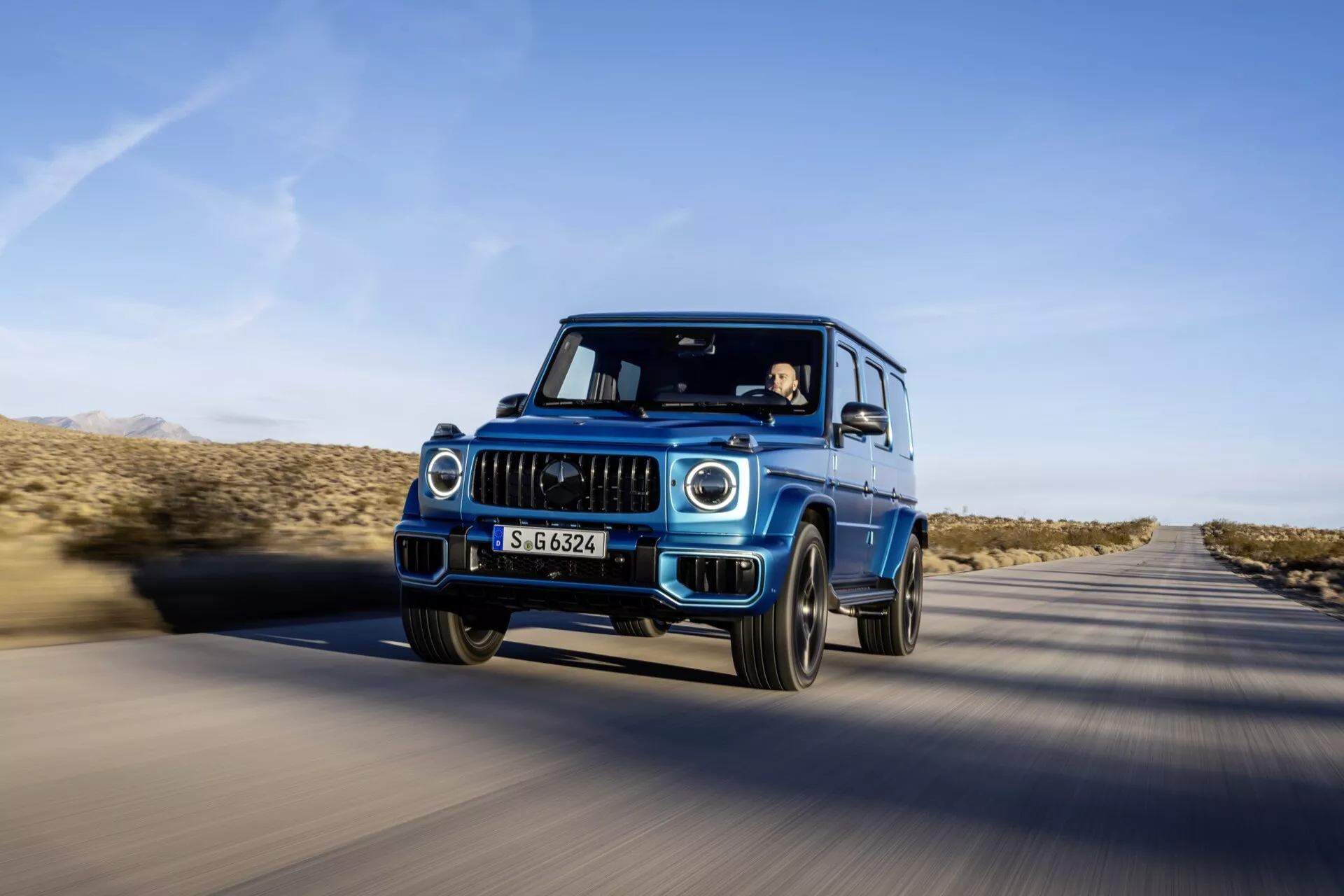 Zewnętrzna strona modelu Mercedes-Benz G-Klasse 465 z 2024 roku prezentująca elegancki design i zaawansowane funkcje
