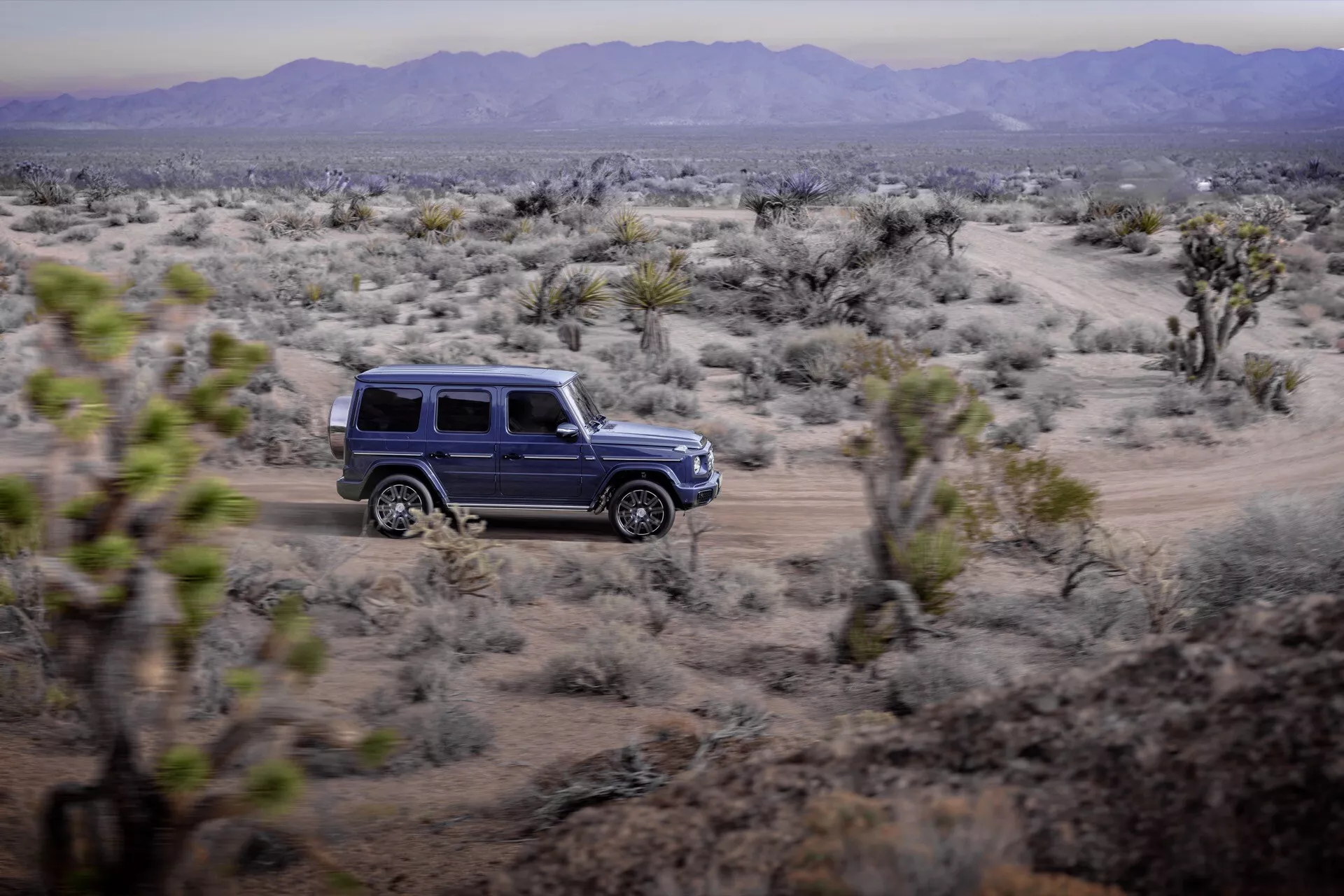 Elegancki model Mercedes-Benz G-Class 465 na rok 2024 w wysokiej rozdzielczości, prezentujący luksusowy design i zaawansowane funkcje