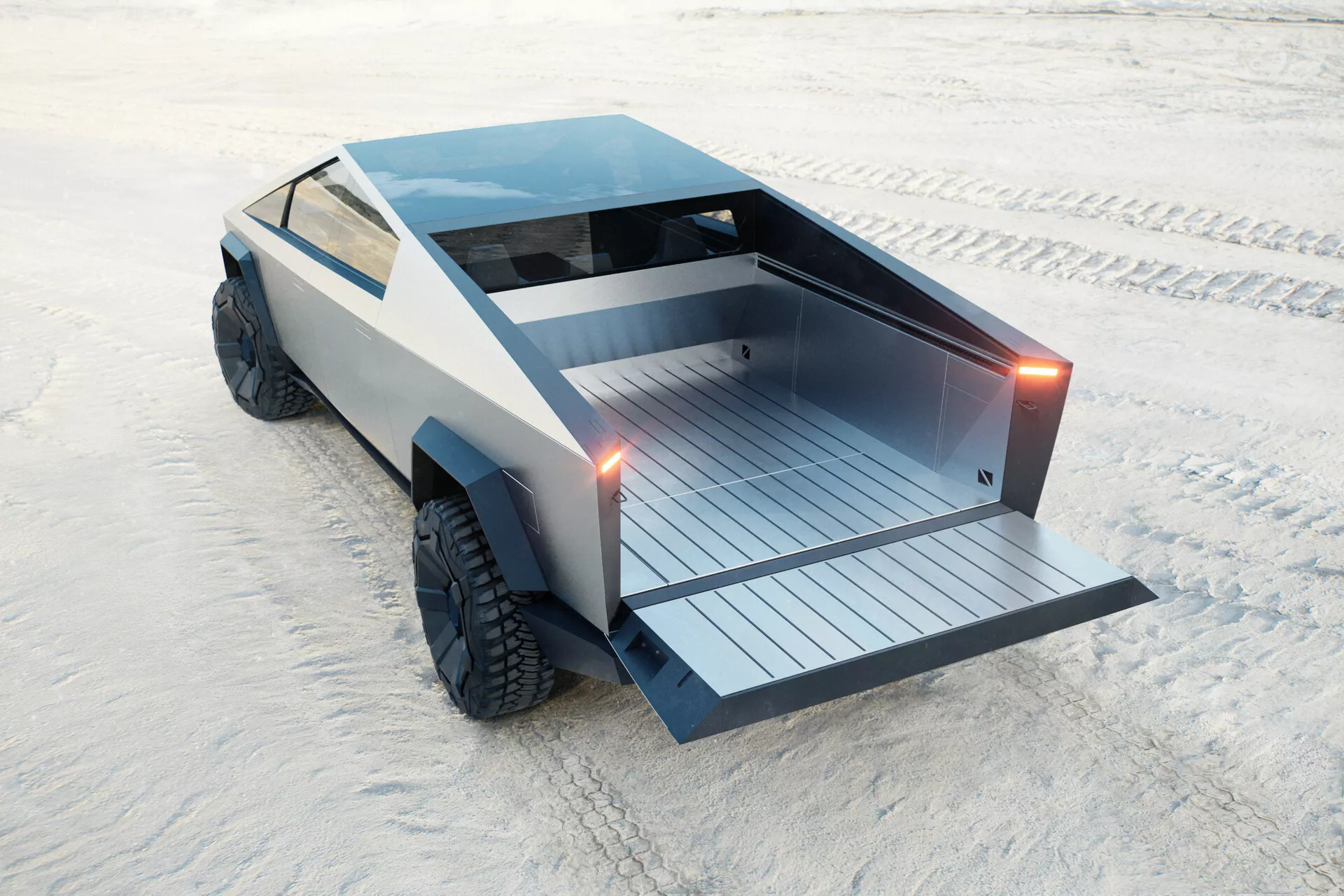 Obraz przedstawia futurystyczny Tesla Cybertruck 2021 (1. generacja) z wysokiego tylnego trzech czwartych kąta, ukazując jego charakterystyczny kanciasty geometryczny design i solidną konstrukcję. Ciężarówka ma metaliczne wykończenie i duże terenowe opony z grubym bieżnikiem, co sugeruje zdolność do jazdy w trudnych warunkach. Znaczące szczegóły obejmują cienkie pionowe tylne światła, płaski obszar ładunkowy z poziomymi listwami i czysty tylni design bez widocznej klamki tylnej klapy. Otoczenie wydaje się być zaśnieżone w jasnym dziennym świetle, podkreślając możliwą zaawansowaną wytrzymałość ciężarówki i lekkie kompozyty dla efektywności.